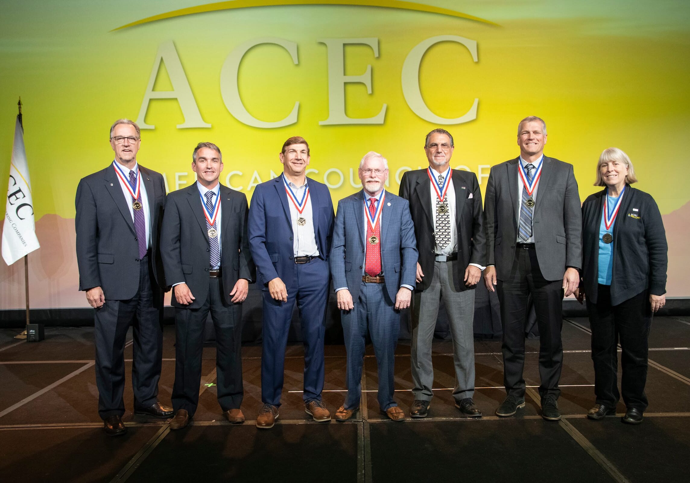 ACEC8836-2795 acec members standing on stage during awarding